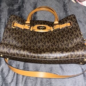 Square heavy Michael Kors handbag